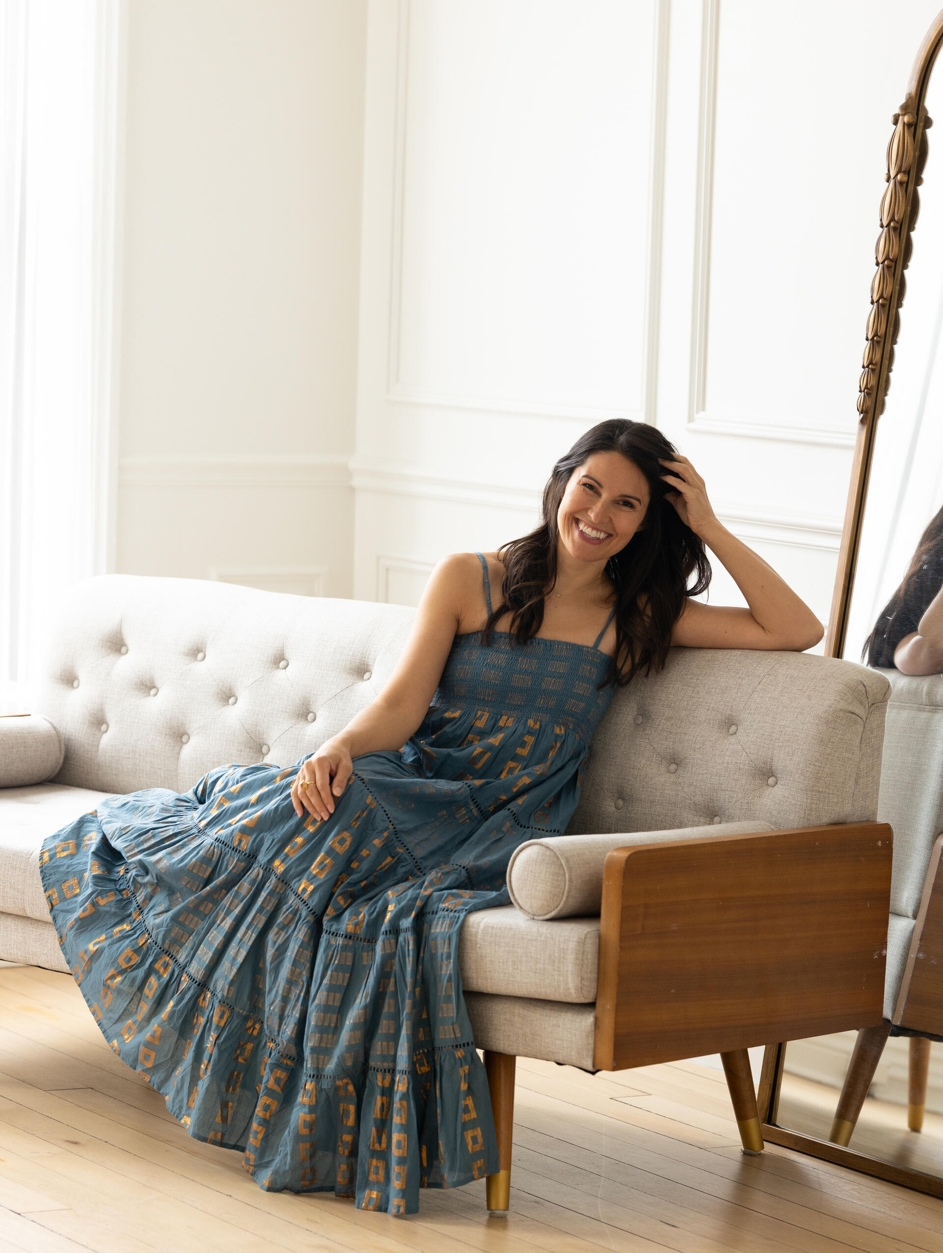 Lena Piskorowski photographed by Emma Burcusel Photography inside her studio in Plymouth, MI Lena dances in a teal and gold foil stamped maxi dress